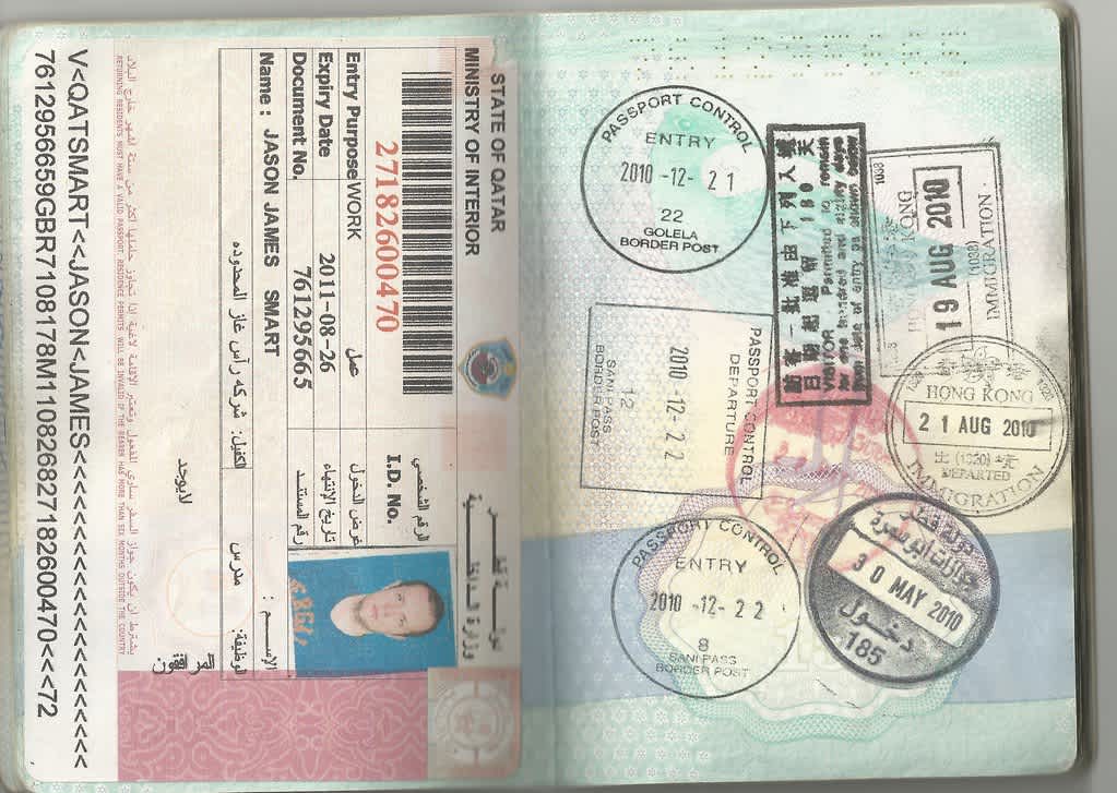 Qatar resident permit page and passport stamps showing visa and entry details for Jason James Smart